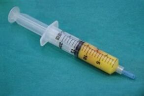 syringe with fatty tissue for penis enlargement